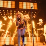 Doja Cat performs in front of a wall of fire on the Tour Ma Vie World Tour at The O2 in London